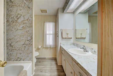 REDUCED!! MAINTENANCE-FREE AND MOVE-IN READY! Welcome to VENICE on Pelican Pointe Golf and Country Club in Florida - for sale on GolfHomes.com, golf home, golf lot