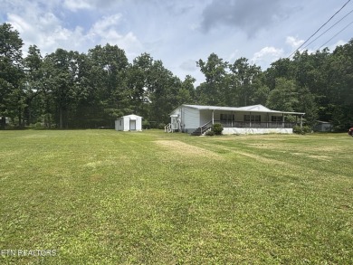Just over an acre in Lake Tansi!! This large split floor plan on Lake Tansi Village Country Club in Tennessee - for sale on GolfHomes.com, golf home, golf lot