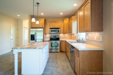 Welcome to 1291 Prestwick Drive, located in The Links at Rolling on The Links At Rolling Meadows in Michigan - for sale on GolfHomes.com, golf home, golf lot