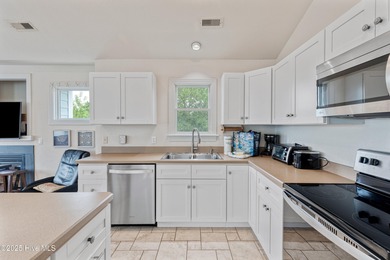 Nestled on a peaceful cul-de-sac in the prestigious Currituck on The Currituck Golf Club in North Carolina - for sale on GolfHomes.com, golf home, golf lot