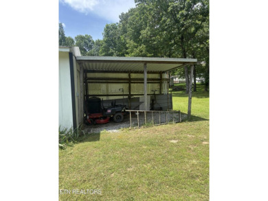 Just over an acre in Lake Tansi!! This large split floor plan on Lake Tansi Village Country Club in Tennessee - for sale on GolfHomes.com, golf home, golf lot