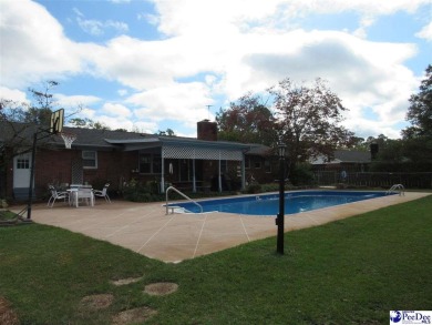 Built in 1969 this meticulously maintained brick home with 2317 on Oakdale Country Club in South Carolina - for sale on GolfHomes.com, golf home, golf lot