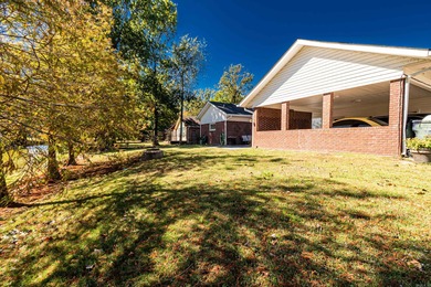 This beautiful home located on the lake village golf course is a on Lake Village Country Club in Arkansas - for sale on GolfHomes.com, golf home, golf lot