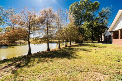 This beautiful home located on the lake village golf course is a on Lake Village Country Club in Arkansas - for sale on GolfHomes.com, golf home, golf lot