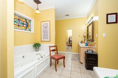 This beautiful home located on the lake village golf course is a on Lake Village Country Club in Arkansas - for sale on GolfHomes.com, golf home, golf lot