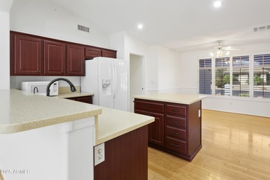 Located in the gated 55+ community of Oakwood in Sun Lakes, this on Oakwood Golf Club  in Arizona - for sale on GolfHomes.com, golf home, golf lot