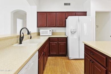 Located in the gated 55+ community of Oakwood in Sun Lakes, this on Oakwood Golf Club  in Arizona - for sale on GolfHomes.com, golf home, golf lot