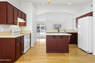 Located in the gated 55+ community of Oakwood in Sun Lakes, this on Oakwood Golf Club  in Arizona - for sale on GolfHomes.com, golf home, golf lot