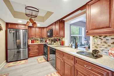 Beautifully updated 2-bedroom, 2-bath residence located in a on Leisureville Community Association in Florida - for sale on GolfHomes.com, golf home, golf lot