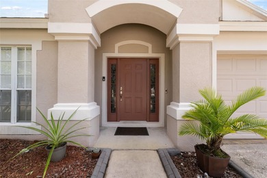 Discover this beautifully updated 4-bedroom, 2-bath home with a on Lexington Oaks Golf Club in Florida - for sale on GolfHomes.com, golf home, golf lot