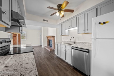 What a deal! Welcome to this 3-bedroom, 2-bath contemporary on Harbour Point Golf Club in North Carolina - for sale on GolfHomes.com, golf home, golf lot