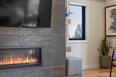 Discover mountain-modern luxury with this stunning 2-bedroom on Osprey Meadows at Tamarack Resort in Idaho - for sale on GolfHomes.com, golf home, golf lot