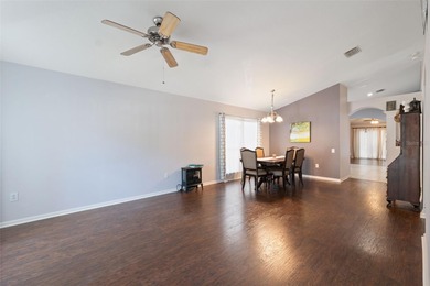 Discover this beautifully updated 4-bedroom, 2-bath home with a on Lexington Oaks Golf Club in Florida - for sale on GolfHomes.com, golf home, golf lot