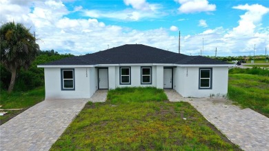 Brand New DUPLEX in Port Charlotte - Never lived in!  Each on Duffys Golf Center in Florida - for sale on GolfHomes.com, golf home, golf lot