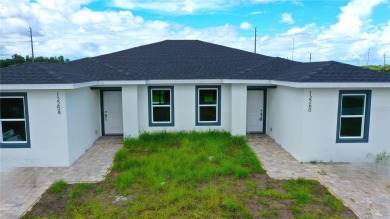 Brand New DUPLEX in Port Charlotte - Never lived in!  Each on Duffys Golf Center in Florida - for sale on GolfHomes.com, golf home, golf lot