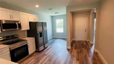 Brand New DUPLEX in Port Charlotte - Never lived in!  Each on Duffys Golf Center in Florida - for sale on GolfHomes.com, golf home, golf lot