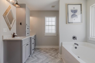 Tucked away in one of Panama City Beach's most desirable gated on Bay Point Resort Golf Club in Florida - for sale on GolfHomes.com, golf home, golf lot