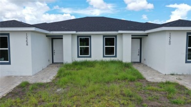 Brand New DUPLEX in Port Charlotte - Never lived in!  Each on Duffys Golf Center in Florida - for sale on GolfHomes.com, golf home, golf lot