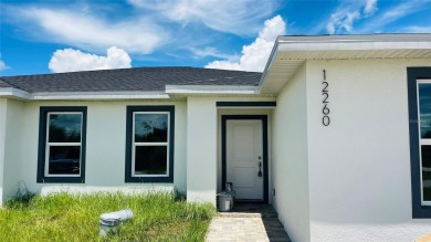 Brand New DUPLEX in Port Charlotte - Never lived in!  Each on Duffys Golf Center in Florida - for sale on GolfHomes.com, golf home, golf lot