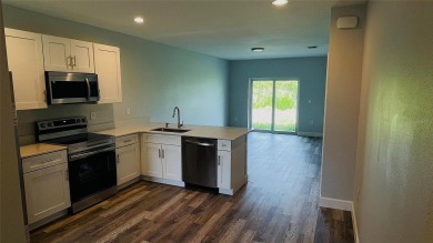Brand New DUPLEX in Port Charlotte - Never lived in!  Each on Duffys Golf Center in Florida - for sale on GolfHomes.com, golf home, golf lot
