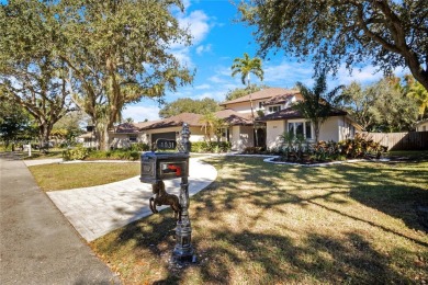 Welcome to this 5BR/4BA custom home on a quiet cul-de-sac with on Jacaranda Golf Club in Florida - for sale on GolfHomes.com, golf home, golf lot