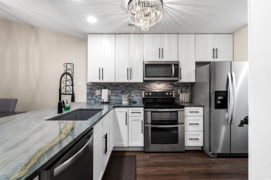 Welcome to this stunning, fully renovated 2-bedroom, top-floor on River Oaks Golf Plantation  in South Carolina - for sale on GolfHomes.com, golf home, golf lot