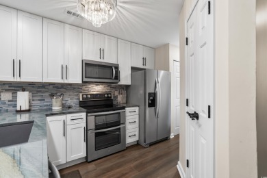 Welcome to this stunning, fully renovated 2-bedroom, top-floor on River Oaks Golf Plantation  in South Carolina - for sale on GolfHomes.com, golf home, golf lot