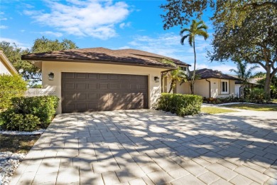 Welcome to this 5BR/4BA custom home on a quiet cul-de-sac with on Jacaranda Golf Club in Florida - for sale on GolfHomes.com, golf home, golf lot