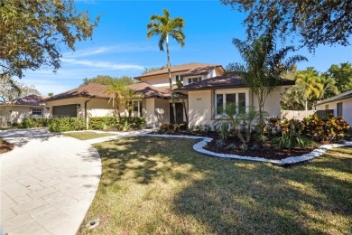 Welcome to this 5BR/4BA custom home on a quiet cul-de-sac with on Jacaranda Golf Club in Florida - for sale on GolfHomes.com, golf home, golf lot