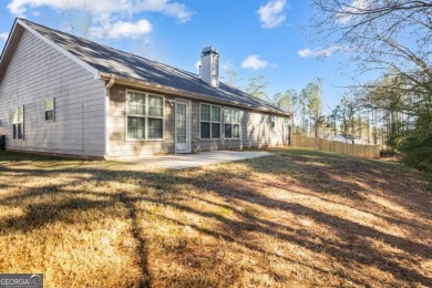 Welcome to this meticulously maintained ranch-style home in the on Canongate At Heron Bay in Georgia - for sale on GolfHomes.com, golf home, golf lot