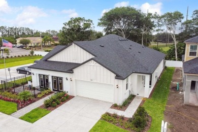 Welcome to the epitome of luxury living at our brand-new paired on The Golf Club of Cypress Creek in Florida - for sale on GolfHomes.com, golf home, golf lot