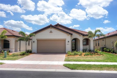 This home just built in 2022 and now available for quick move in on Sarasota National Golf Club in Florida - for sale on GolfHomes.com, golf home, golf lot