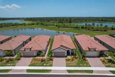 This home just built in 2022 and now available for quick move in on Sarasota National Golf Club in Florida - for sale on GolfHomes.com, golf home, golf lot