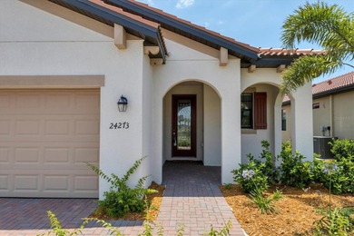 This home just built in 2022 and now available for quick move in on Sarasota National Golf Club in Florida - for sale on GolfHomes.com, golf home, golf lot