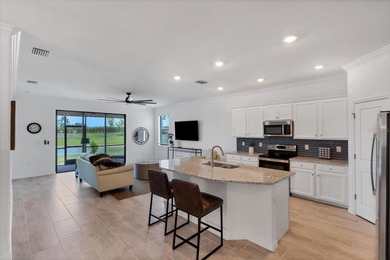 This home just built in 2022 and now available for quick move in on Sarasota National Golf Club in Florida - for sale on GolfHomes.com, golf home, golf lot