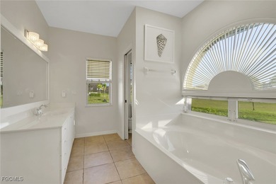 Discover Florida living at its finest! This beautifully updated on Royal Tee Country Club in Florida - for sale on GolfHomes.com, golf home, golf lot