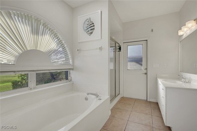 Discover Florida living at its finest! This beautifully updated on Royal Tee Country Club in Florida - for sale on GolfHomes.com, golf home, golf lot