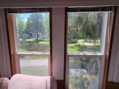 WATER VIEWS FROM YOUR LIVING ROOM!  Unusual park model; the on Cascade Golf Course in Idaho - for sale on GolfHomes.com, golf home, golf lot