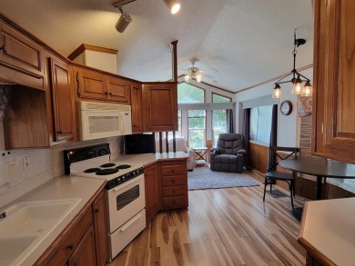 WATER VIEWS FROM YOUR LIVING ROOM!  Unusual park model; the on Cascade Golf Course in Idaho - for sale on GolfHomes.com, golf home, golf lot
