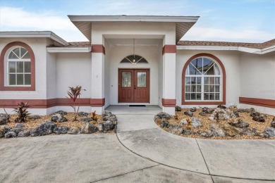 Welcome to your dream home nestled in the serene Rotonda West on Rotonda Golf and Country Club - Long Marsh  in Florida - for sale on GolfHomes.com, golf home, golf lot