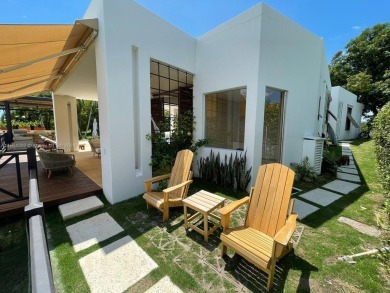 Spectacular property completely remodeled in 2021 located inside on  in  - for sale on GolfHomes.com, golf home, golf lot
