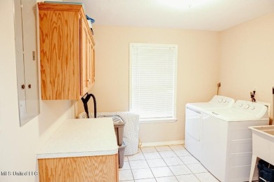 Are you looking for a home with room and space to raise a large on Mississippi National Golf Course in Mississippi - for sale on GolfHomes.com, golf home, golf lot