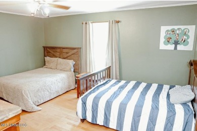 Are you looking for a home with room and space to raise a large on Mississippi National Golf Course in Mississippi - for sale on GolfHomes.com, golf home, golf lot
