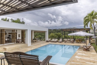 Spectacular property completely remodeled in 2021 located inside on  in  - for sale on GolfHomes.com, golf home, golf lot