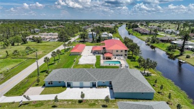 This nearly completed WATERFRONT TRIPLEX in Rotonda West, FL, is on Rotonda Golf and Country Club The Palms Course in Florida - for sale on GolfHomes.com, golf home, golf lot