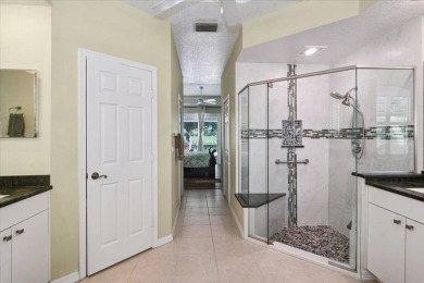 Tucked away in the prestigious PGA Village, where lush fairways on The Legacy Golf and Tennis Club in Florida - for sale on GolfHomes.com, golf home, golf lot