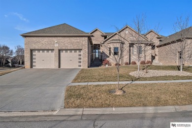 Welcome all to this luxurious brick townhome, situated on a on Wilderness Ridge Golf Club in Nebraska - for sale on GolfHomes.com, golf home, golf lot