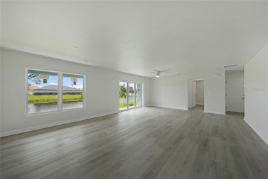 This nearly completed WATERFRONT TRIPLEX in Rotonda West, FL, is on Rotonda Golf and Country Club The Palms Course in Florida - for sale on GolfHomes.com, golf home, golf lot