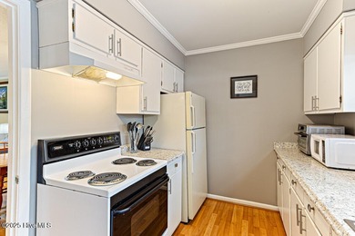 Lovely brick condominium in great location close to downtown on The National Golf Club in North Carolina - for sale on GolfHomes.com, golf home, golf lot