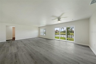 This nearly completed WATERFRONT TRIPLEX in Rotonda West, FL, is on Rotonda Golf and Country Club The Palms Course in Florida - for sale on GolfHomes.com, golf home, golf lot